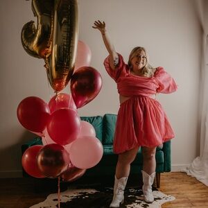 Pink puff dress with cut outs on the side